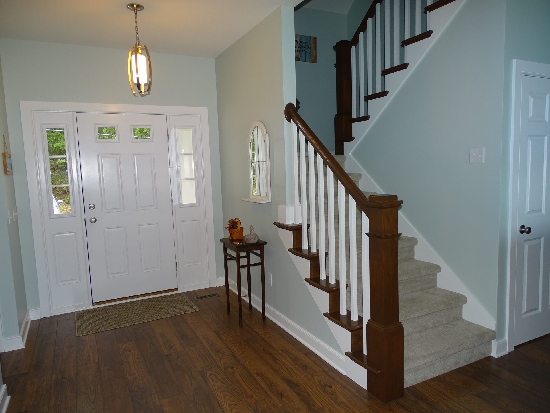 Staircase and foyer in lake home